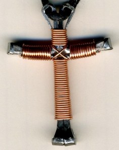 cross with copper wire